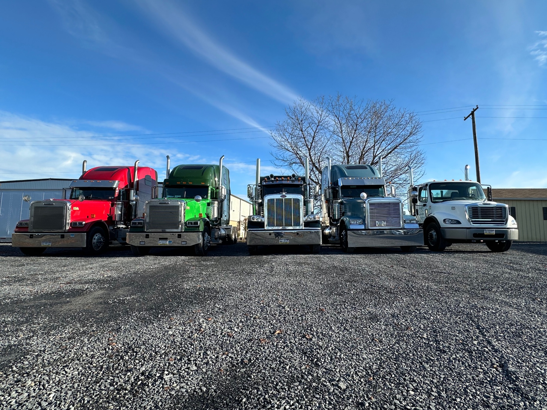 Aerial view of Edo's Trucking fleet at loading dock